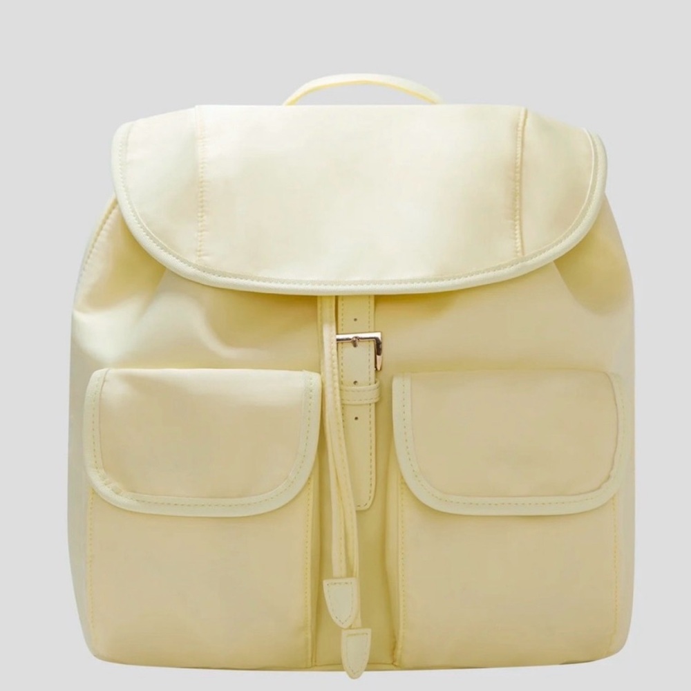 Year of ours yellow butter backpack - never used, still in plastic